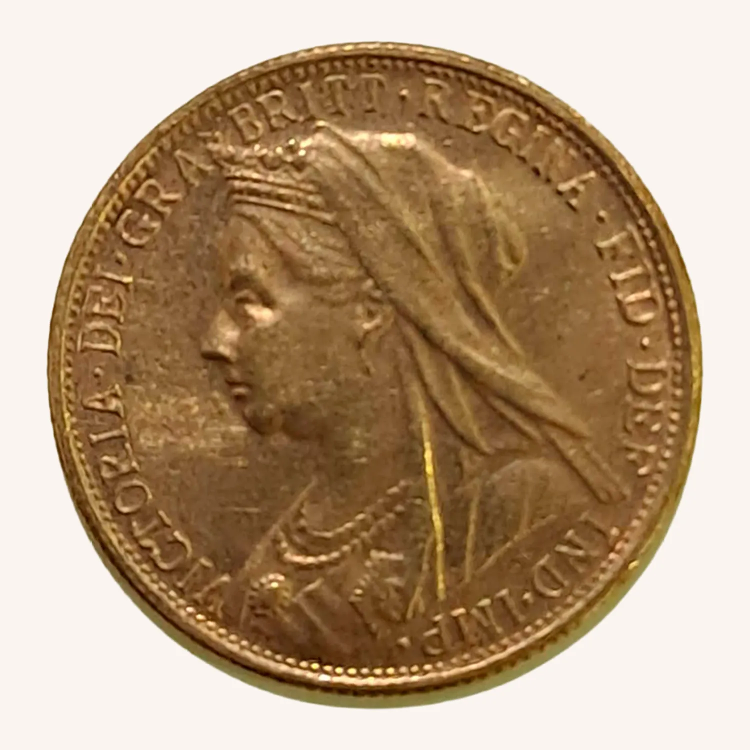 Moneda de 1910 con retrato femenino coronado de perfil